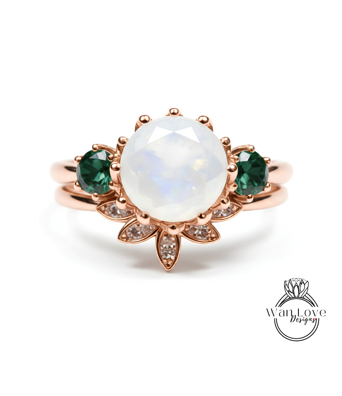 A rose gold ring with a large oval-shaped stone at the center, surrounded by smaller stones and a leaf-shaped design.