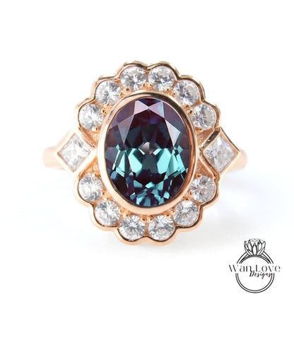 A gold ring with a large oval-shaped gemstone at the center, surrounded by smaller diamonds.