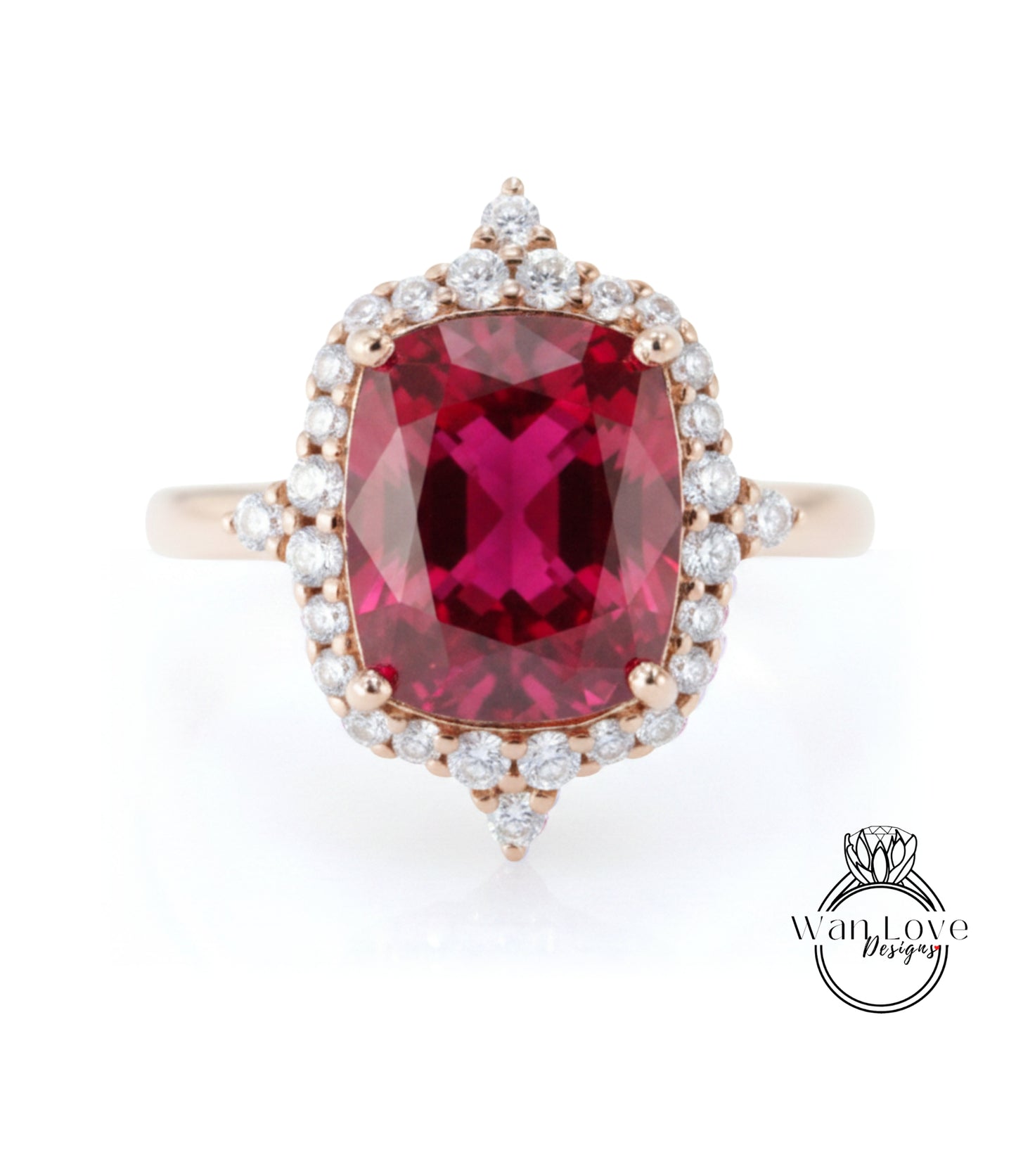 A large, vibrant red gemstone set in a gold ring with a halo of smaller diamonds around it.