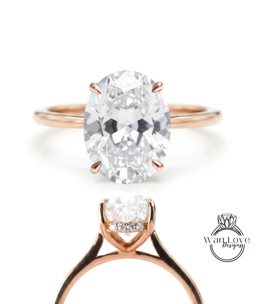 a beautiful diamond engagement ring with a large oval-shaped diamond set in a rose gold band.