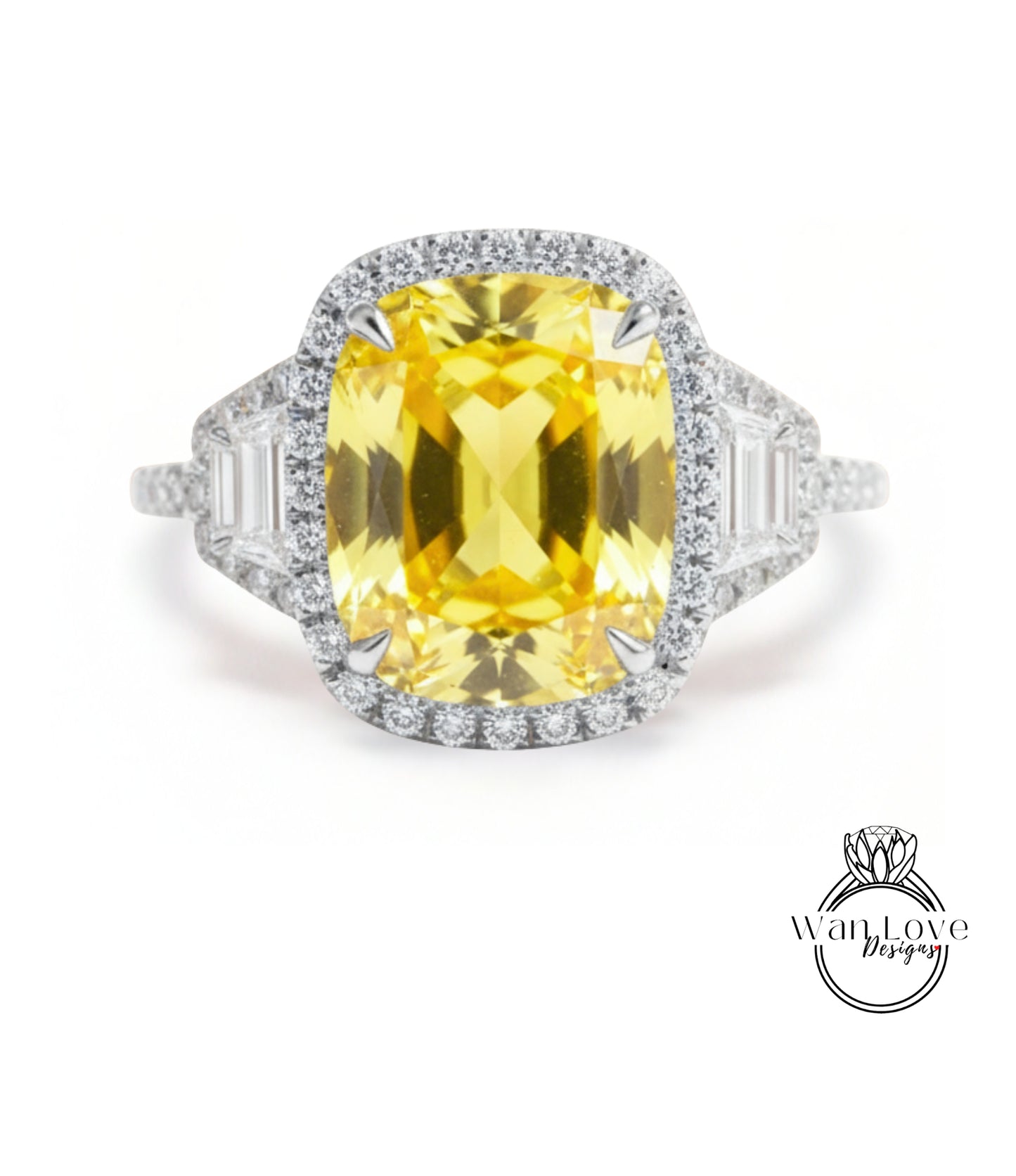 A large yellow gemstone ring with a halo of smaller diamonds around it.