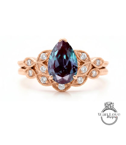 a beautiful engagement ring with a large, deep purple gemstone set in an ornate gold band.