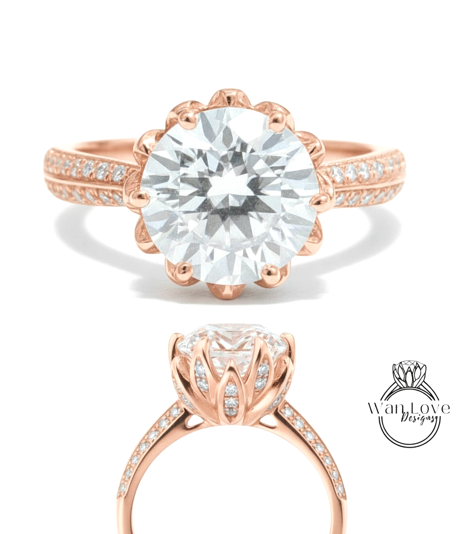 a beautiful rose gold engagement ring with a large, round diamond set in the center. The ring has a scalloped band and is adorned with small diamonds around the band.