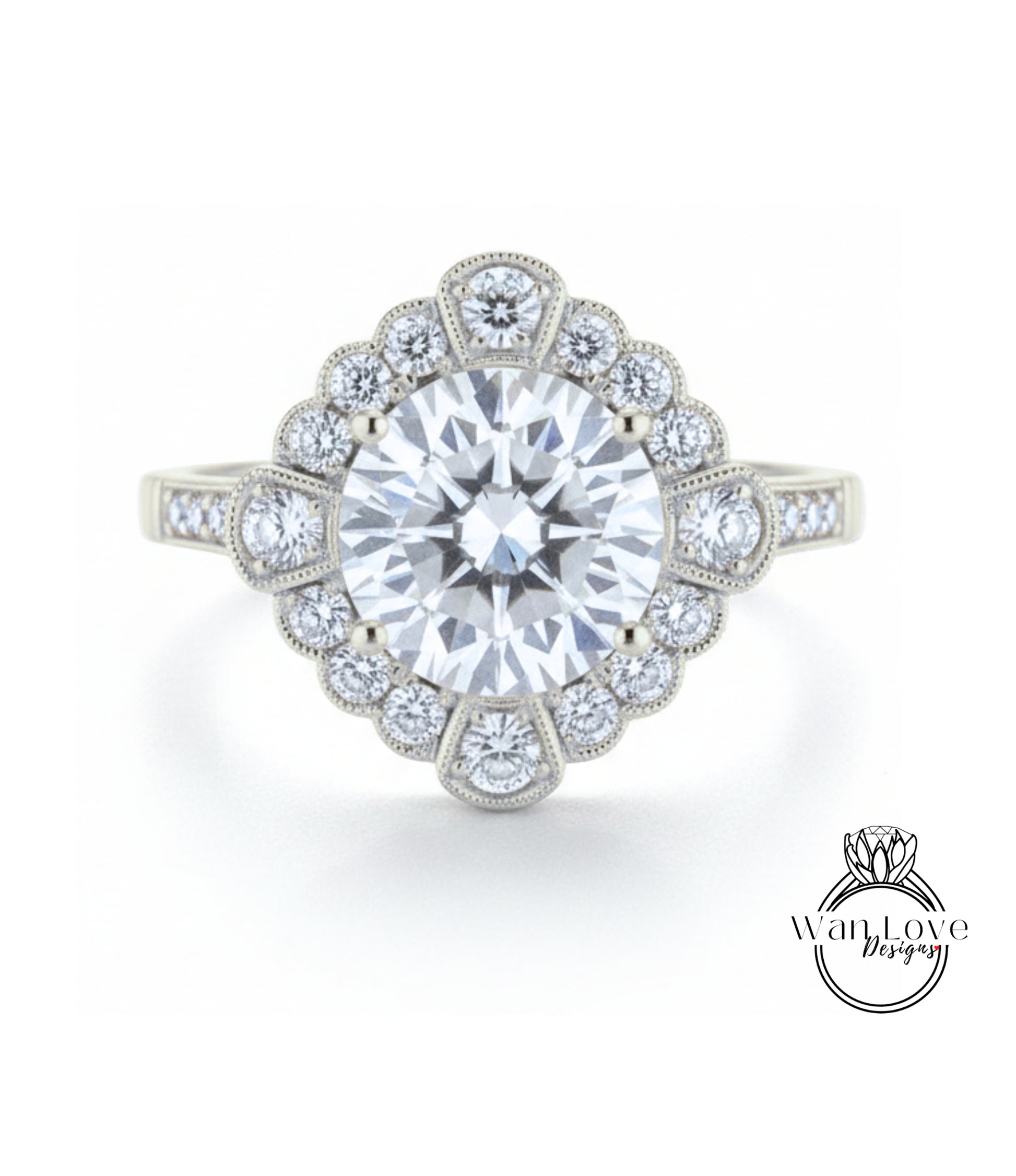 A stunning diamond engagement ring with a large central diamond surrounded by smaller diamonds set in a halo-like design.