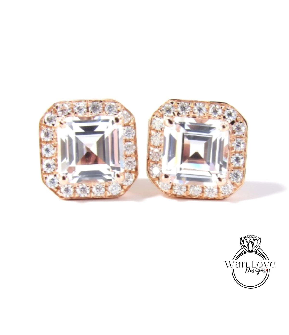 A pair of elegant earrings with large, clear gemstones set in a gold-toned metal frame.