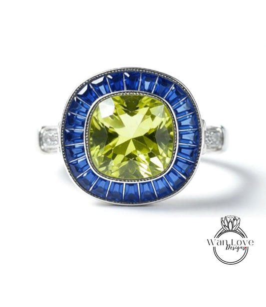 A ring with a large, vibrant green gemstone surrounded by a blue and silver band.