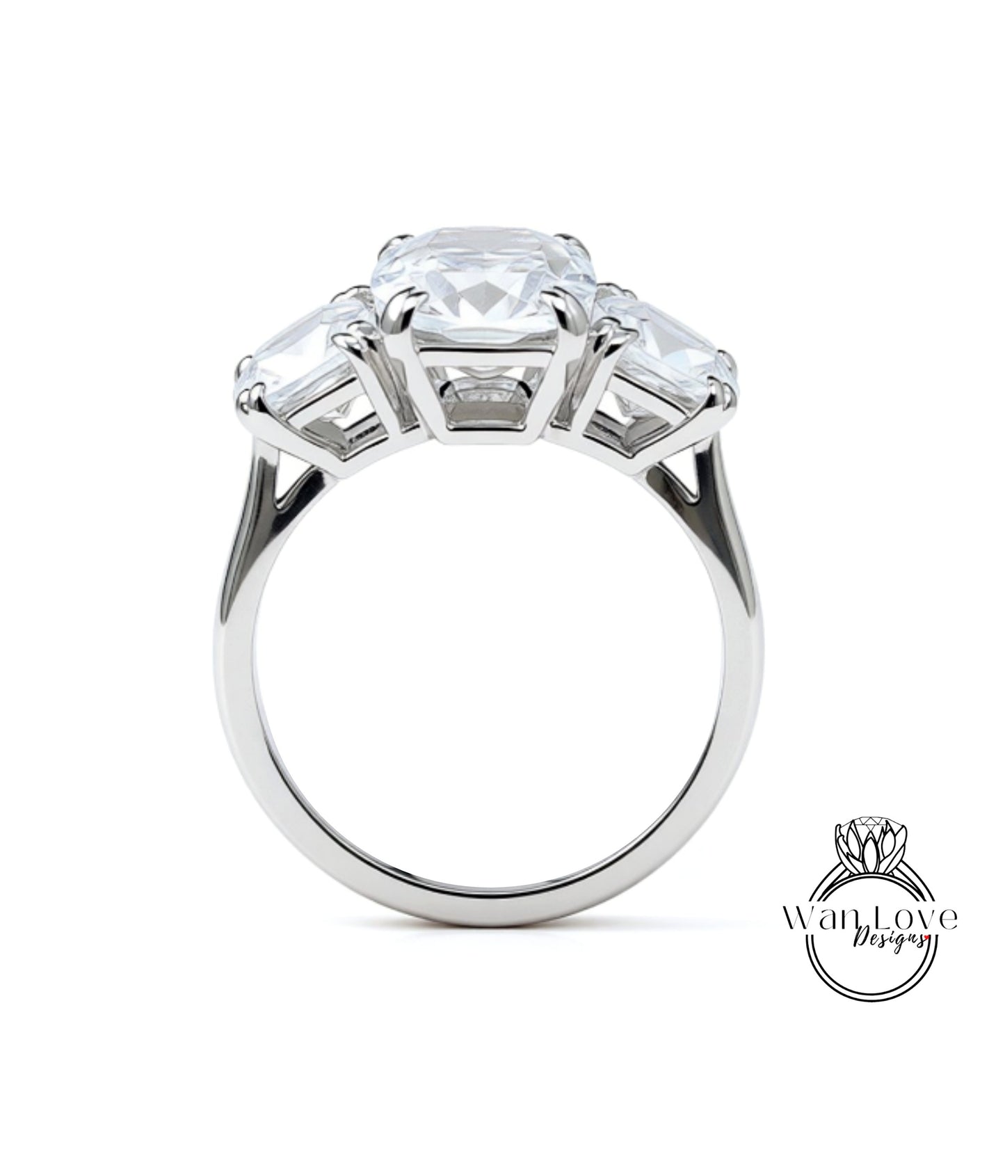 A silver ring with a large central diamond surrounded by three smaller diamonds on either side.
