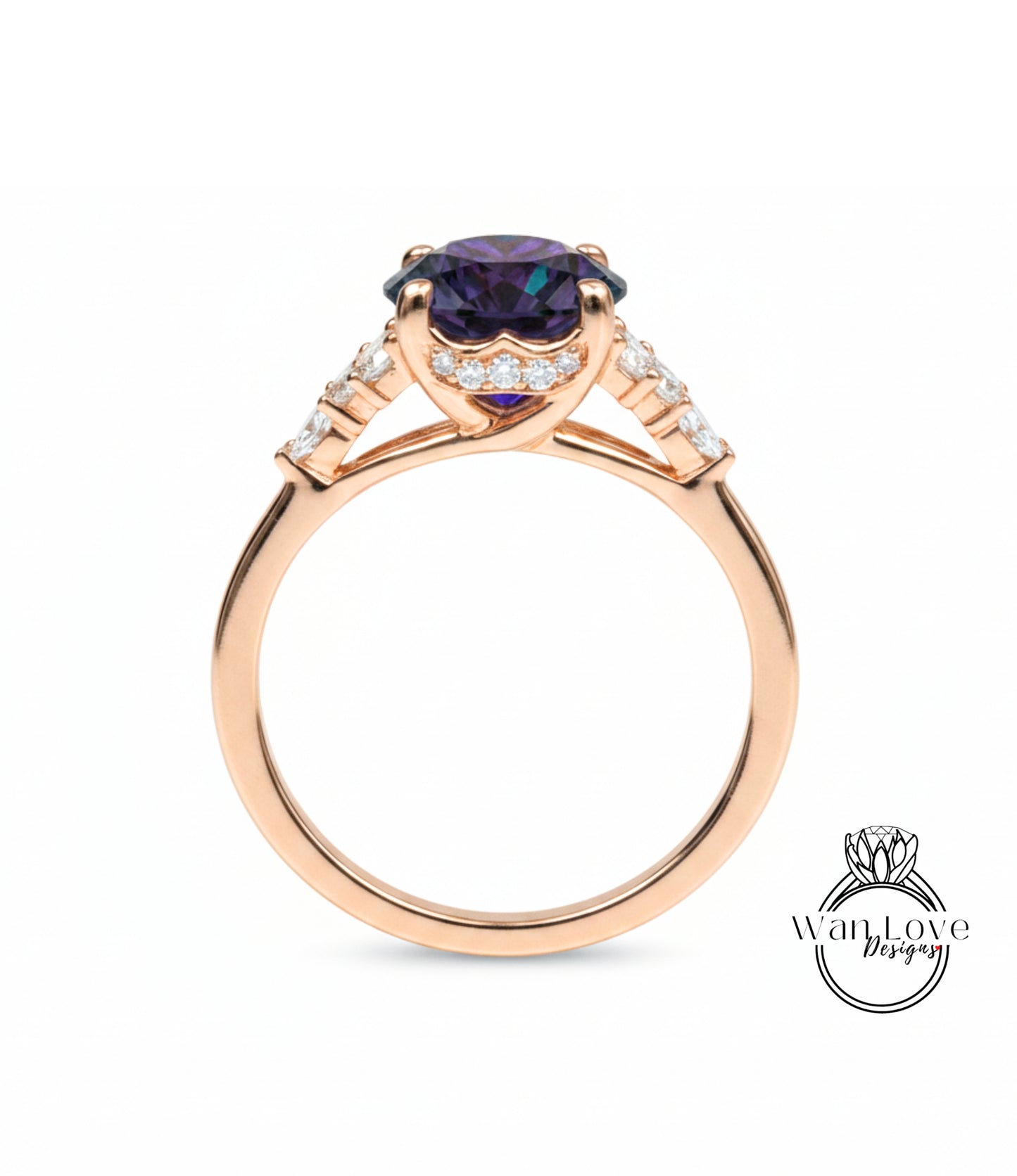 A gold ring with a large purple gemstone set in the center, surrounded by smaller diamonds.