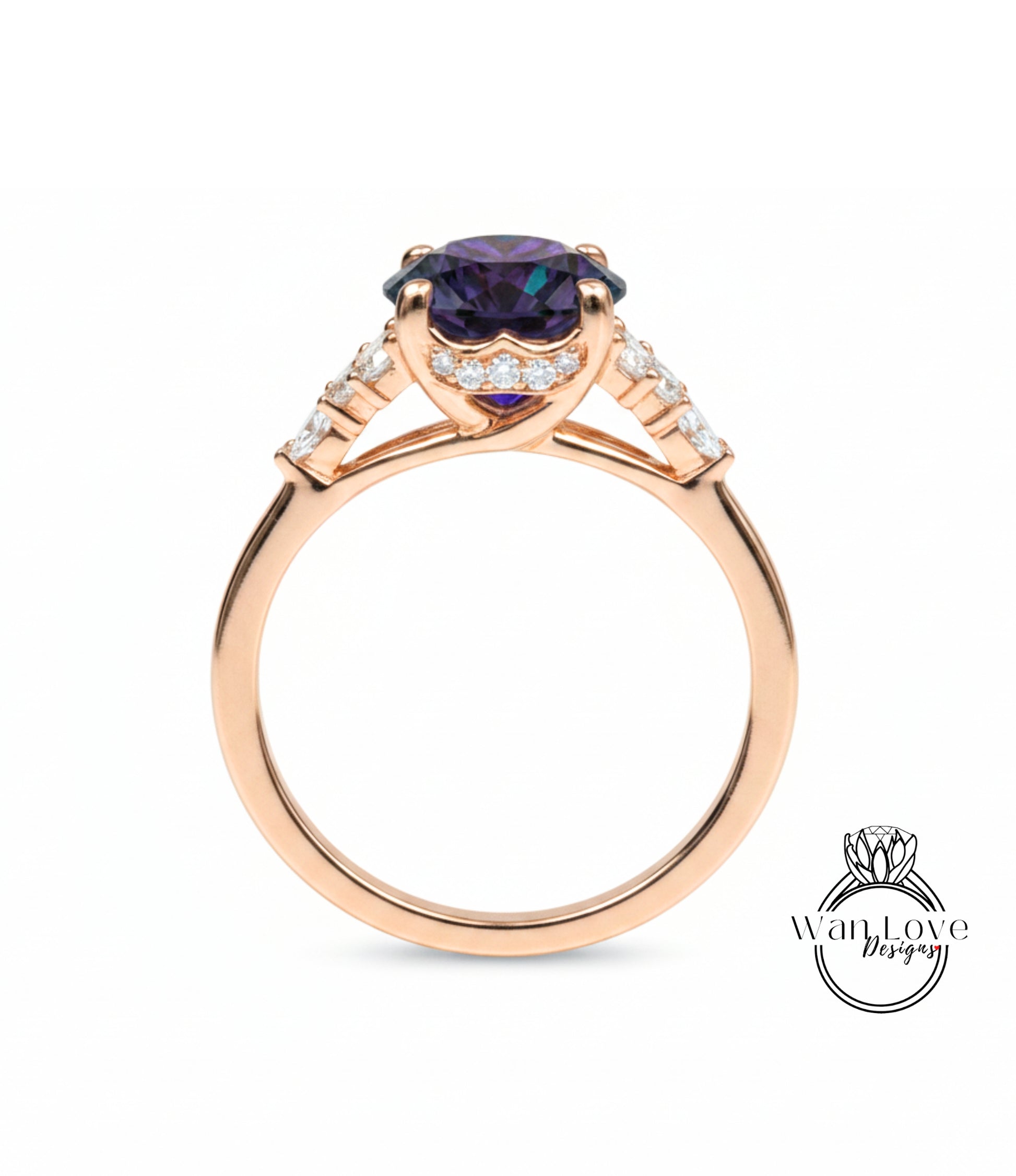 A gold ring with a large purple gemstone set in the center, surrounded by smaller diamonds.