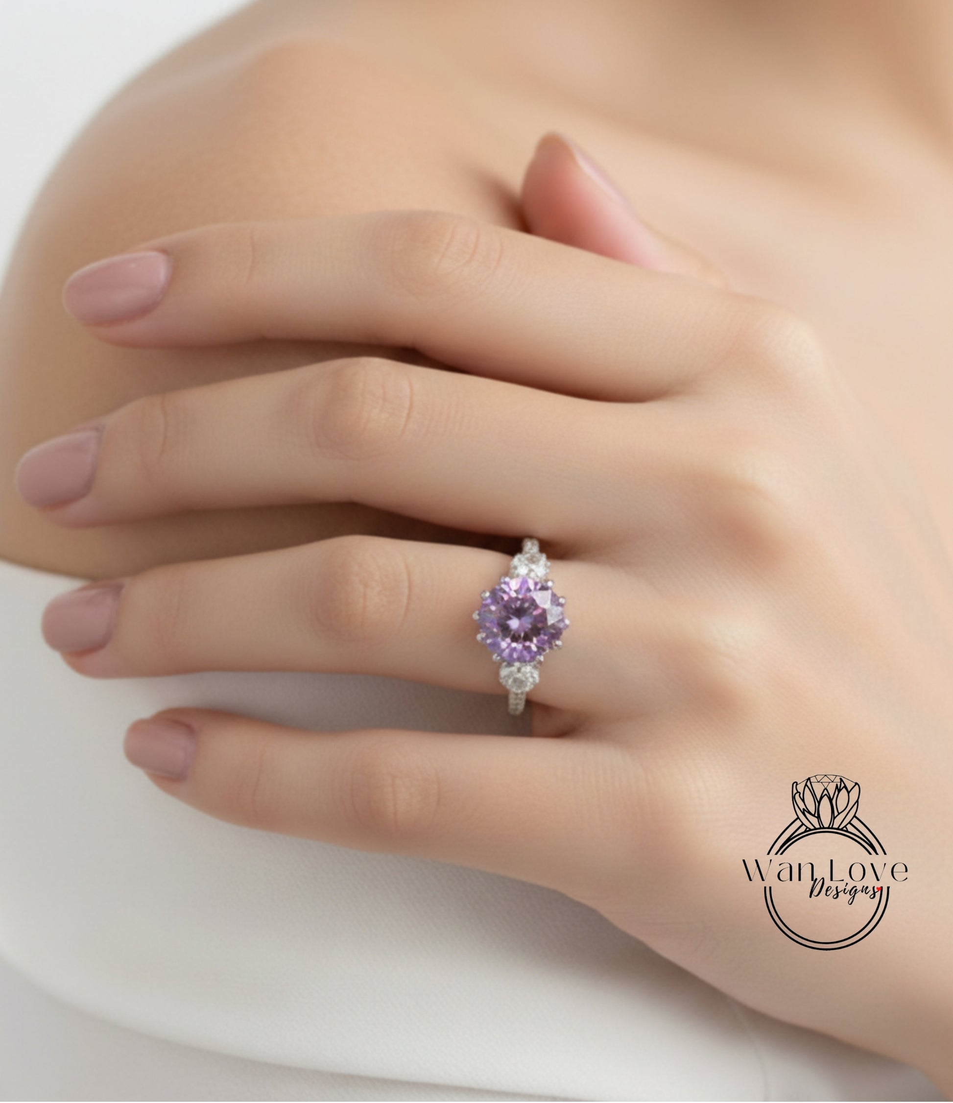 A close-up of a hand wearing a ring with a large purple gemstone.