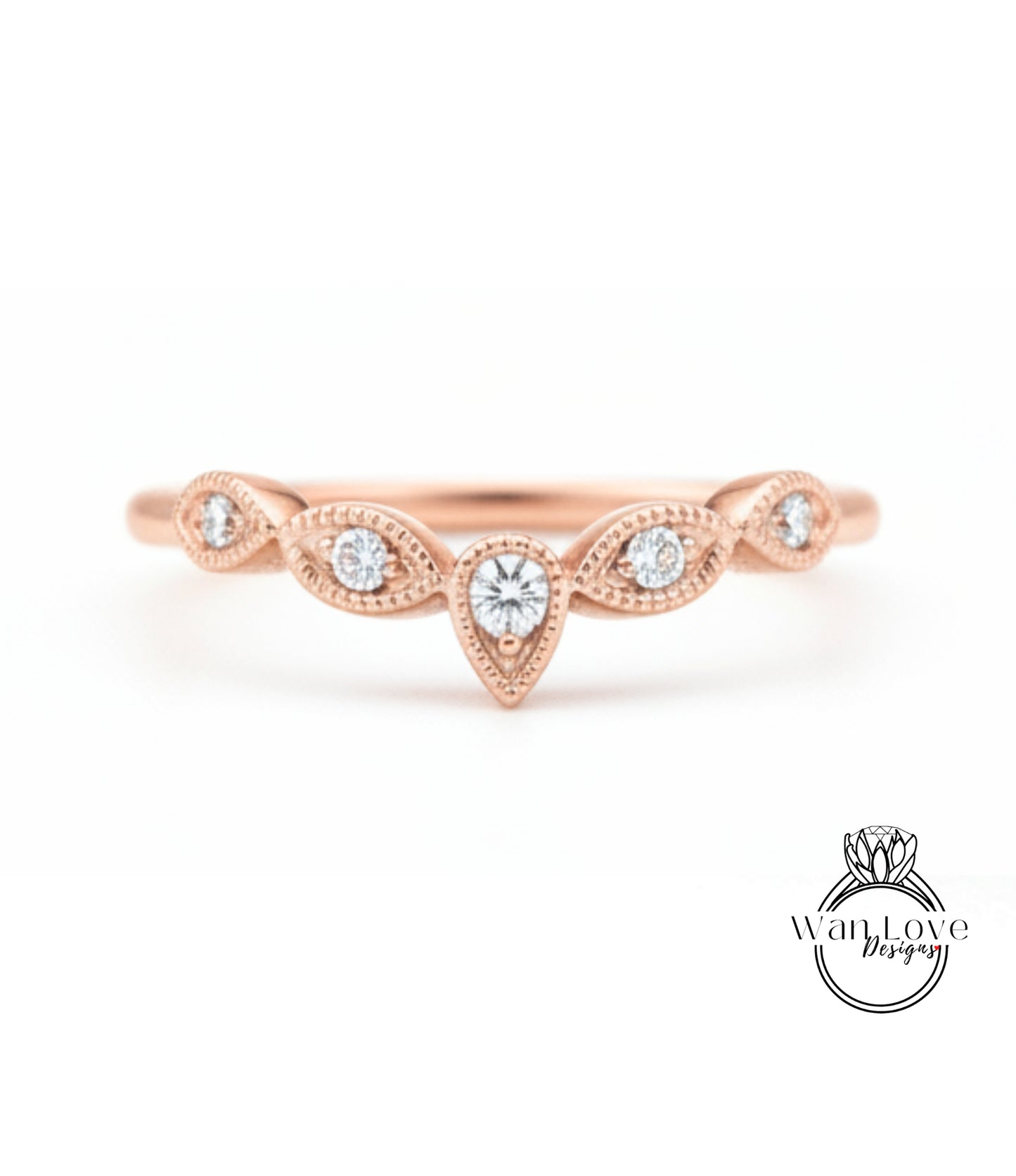 A rose gold ring with a central diamond and smaller diamonds arranged in a decorative pattern around it.