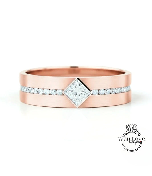 A rose gold ring with a large diamond set in the center, surrounded by smaller diamonds.