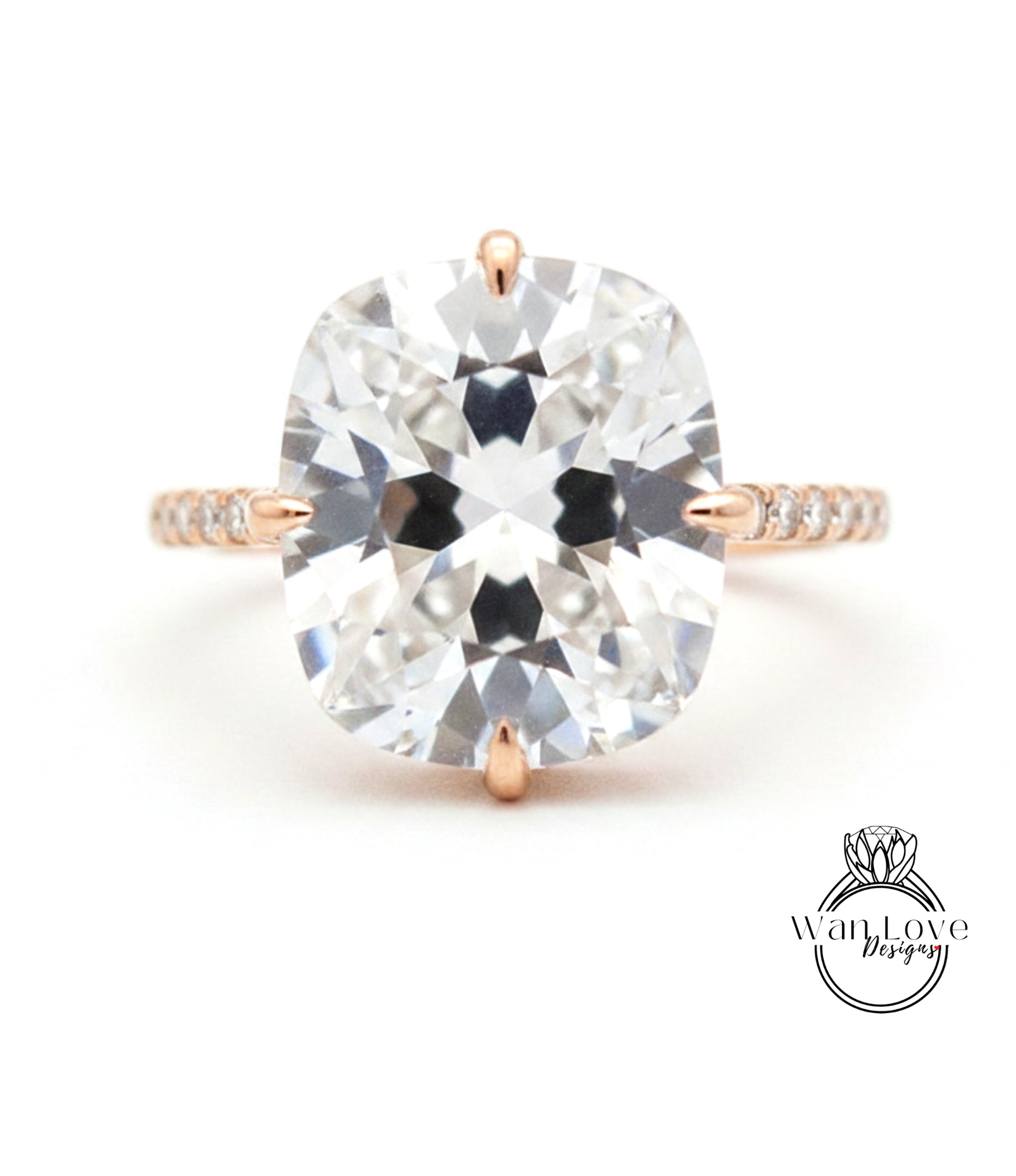 A large, clear diamond engagement ring with a prominent center stone and a delicate band.