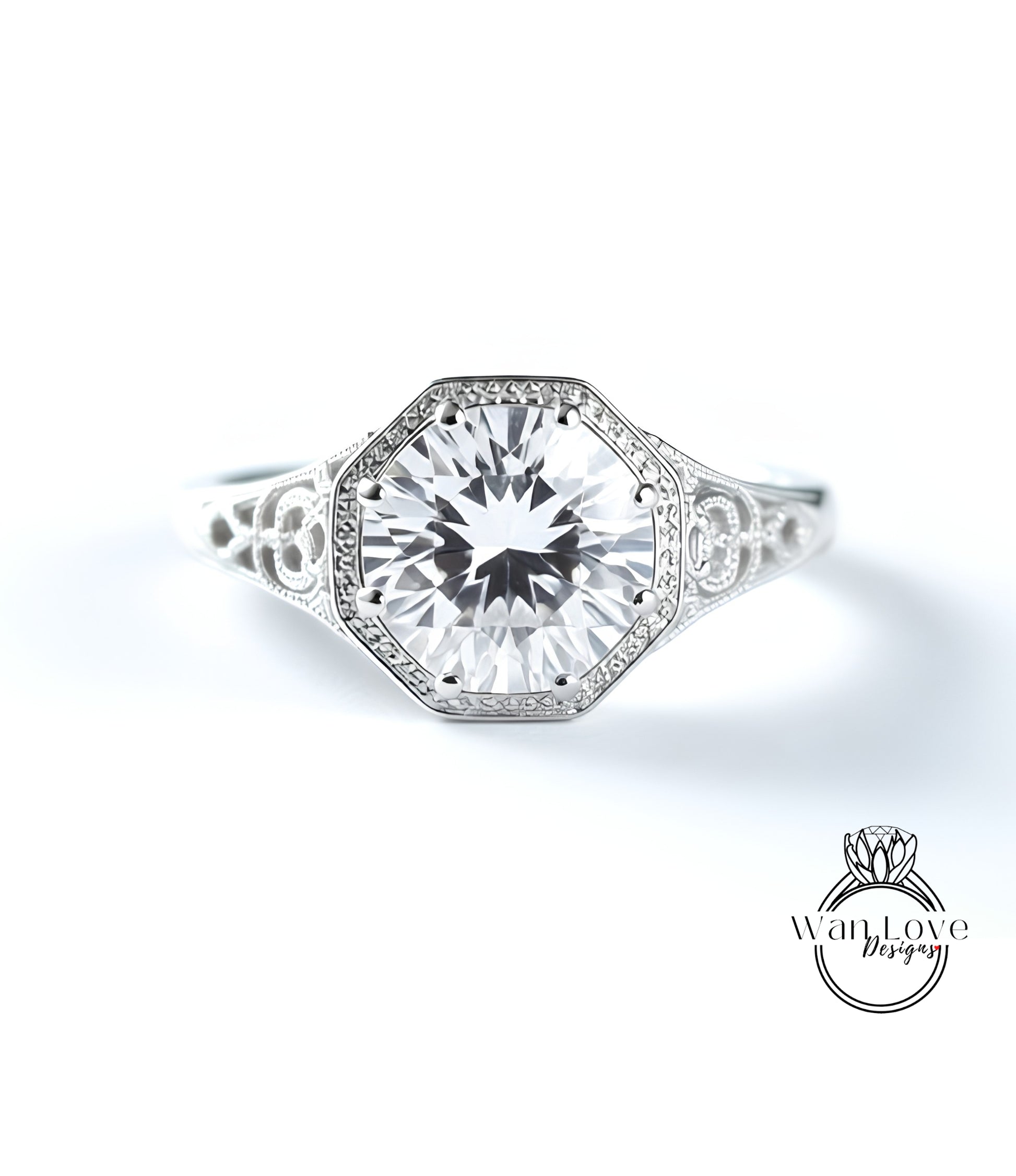 A close-up view of a diamond engagement ring with a large central diamond surrounded by smaller diamonds set in an ornate band.