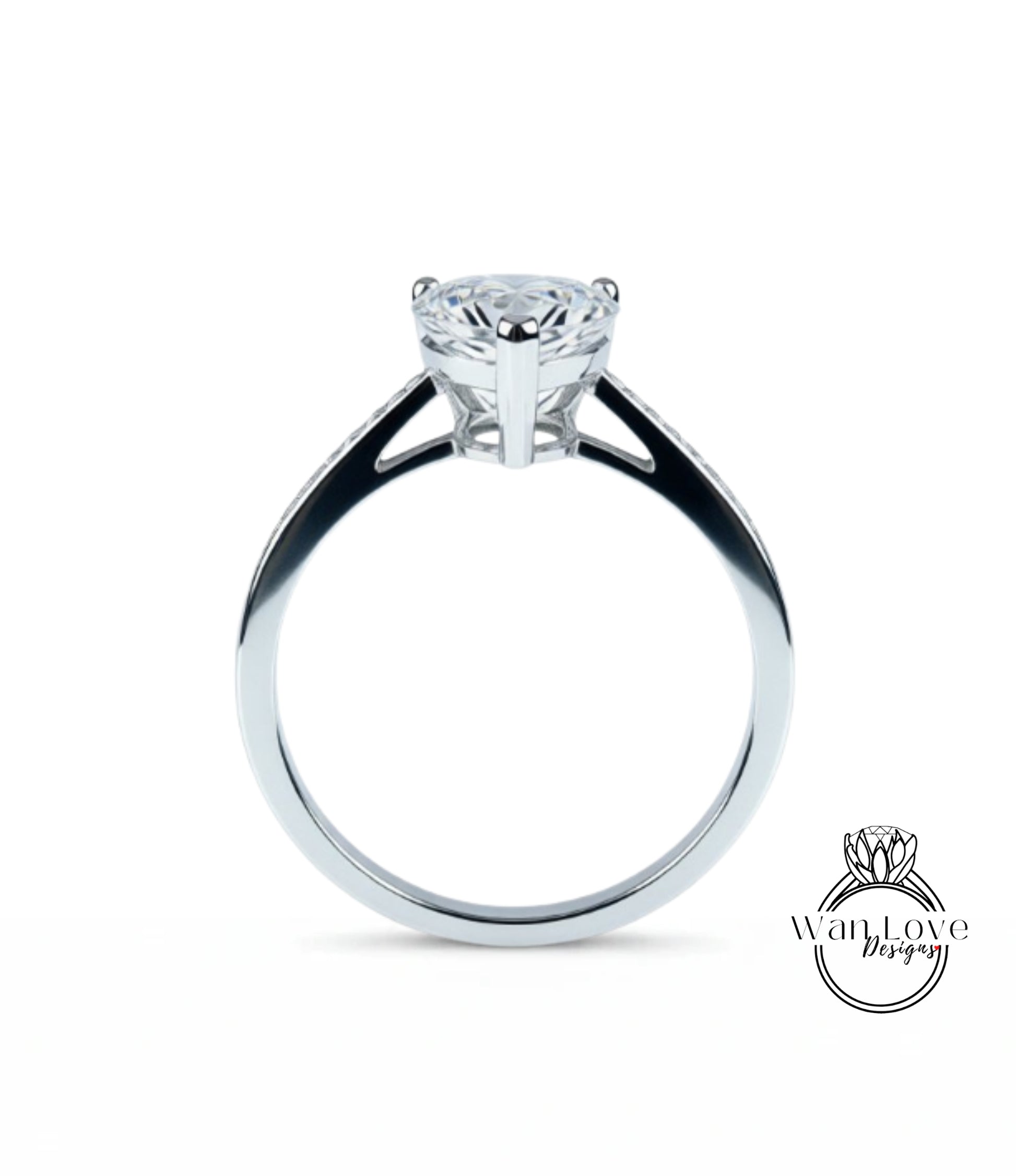A silver engagement ring with a large diamond set in the center.