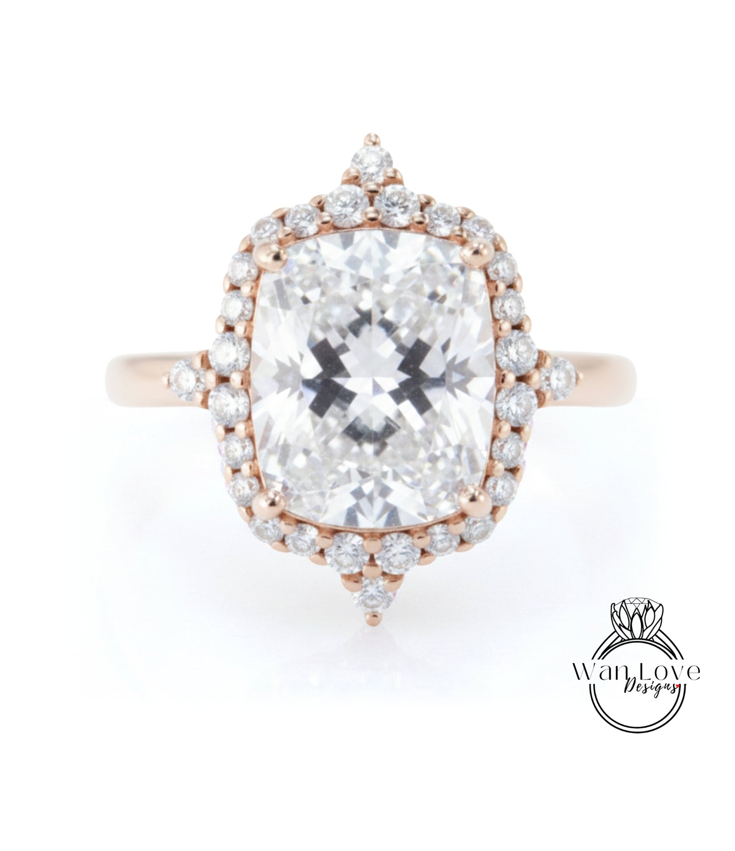 A large, clear diamond engagement ring with a halo of smaller diamonds around the center stone.