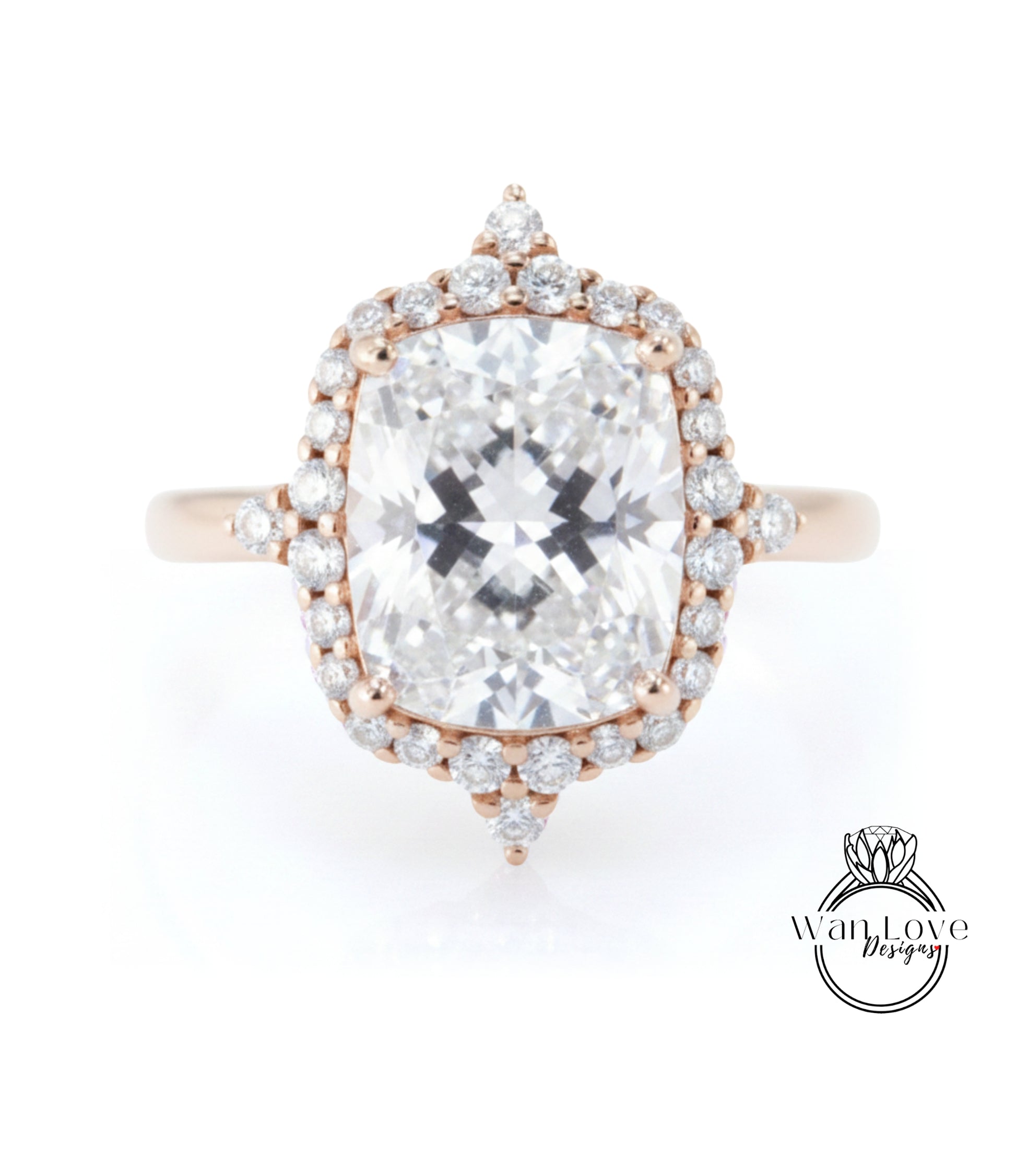 A large, clear diamond engagement ring with a halo of smaller diamonds around the center stone.