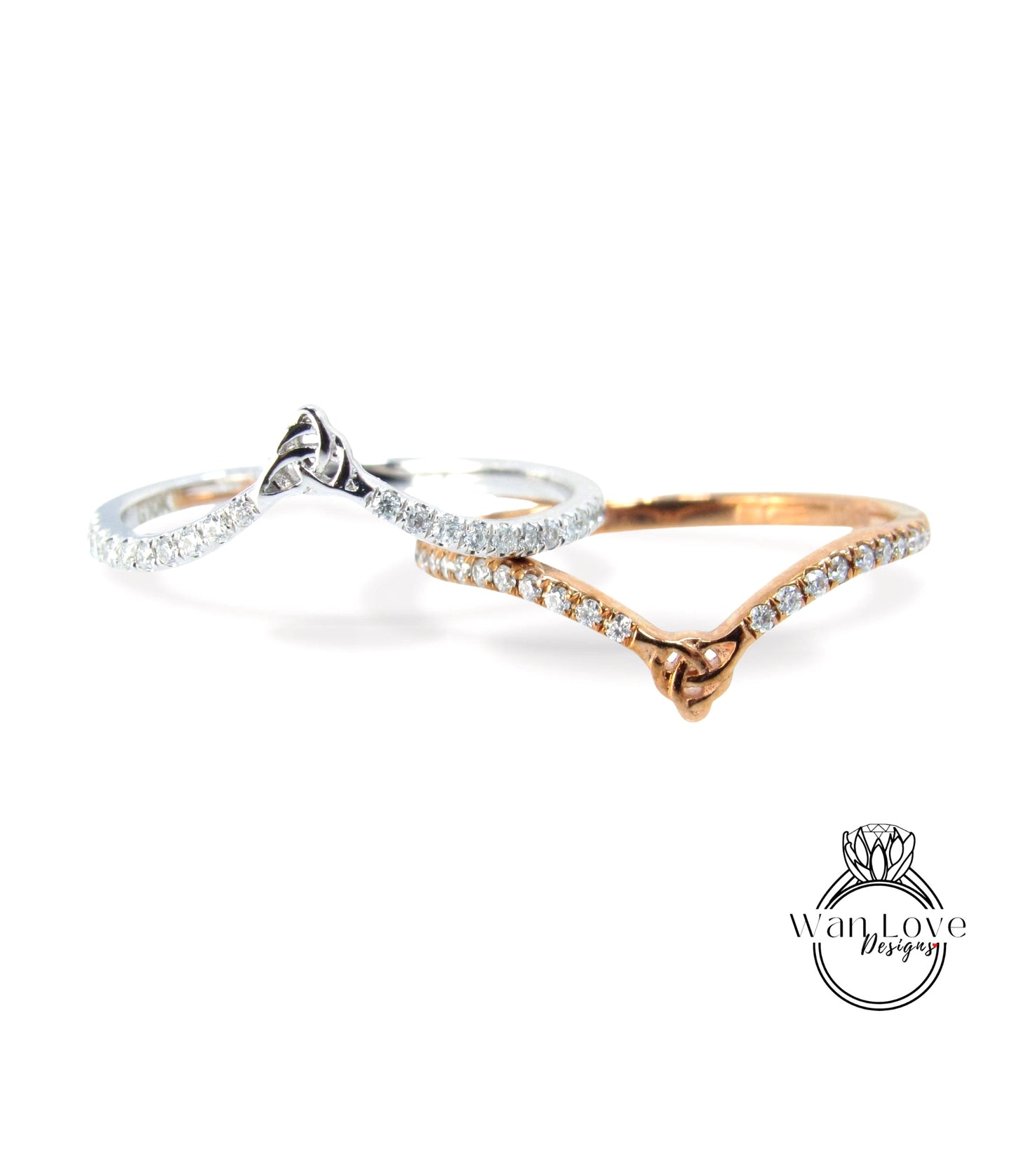 Two rings with a silver band and a gold band with a silver band, both adorned with small diamonds.