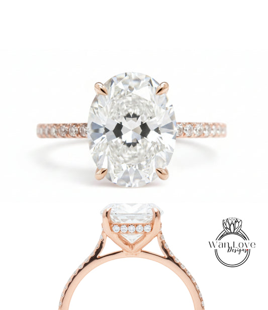 a beautiful diamond engagement ring with a large oval-shaped diamond set in a rose gold band.