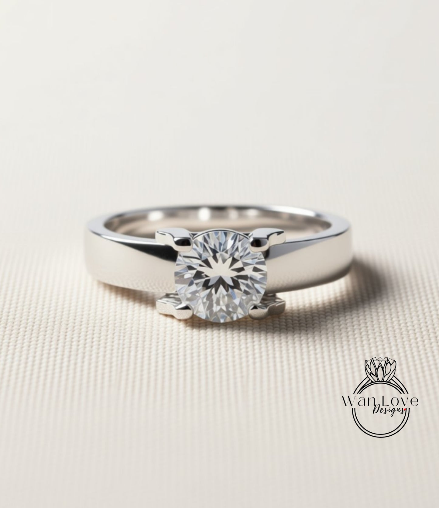 A close-up image of a silver ring with a large, clear diamond set in the center.