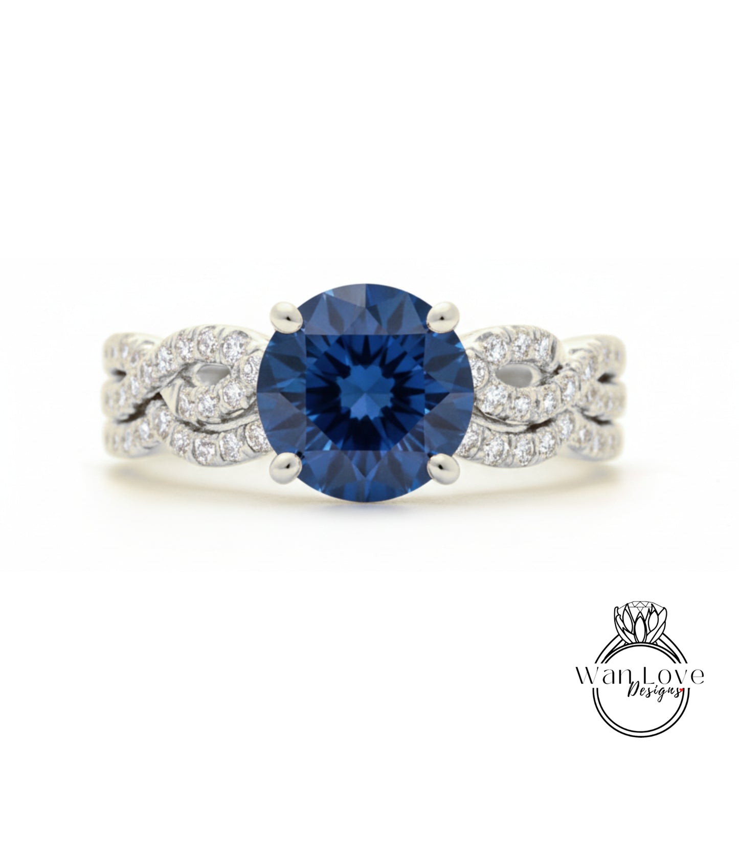 A stunning blue diamond engagement ring with a large central diamond surrounded by smaller diamonds set in a silver band.