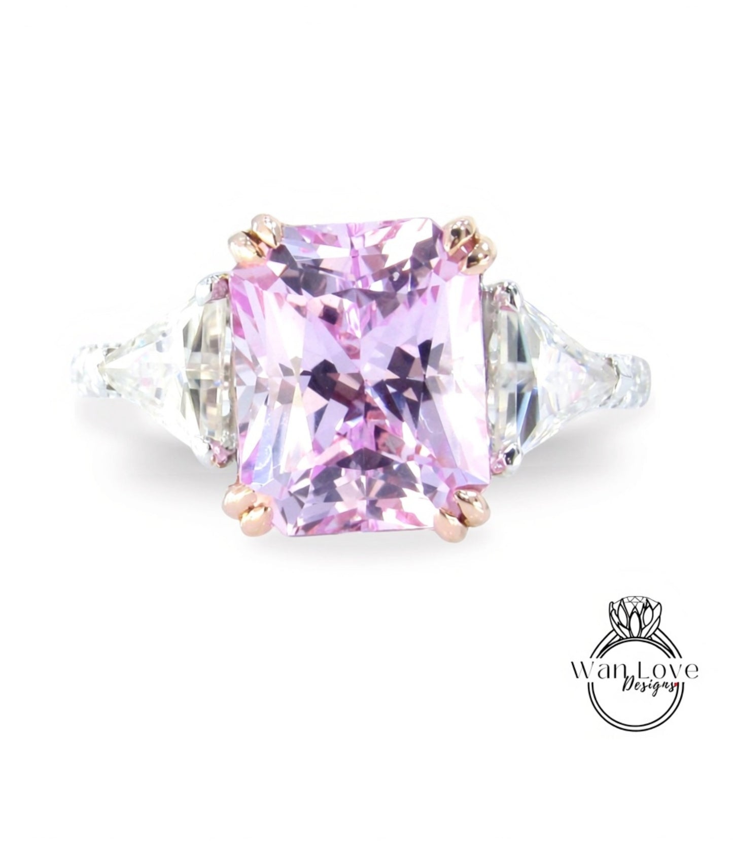 A large, pink gemstone ring with a diamond-encrusted band.