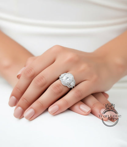 A close-up of a person's hands wearing a large, ornate diamond ring.