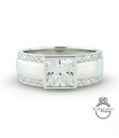 A silver ring with a large diamond in the center, surrounded by smaller diamonds along the band.