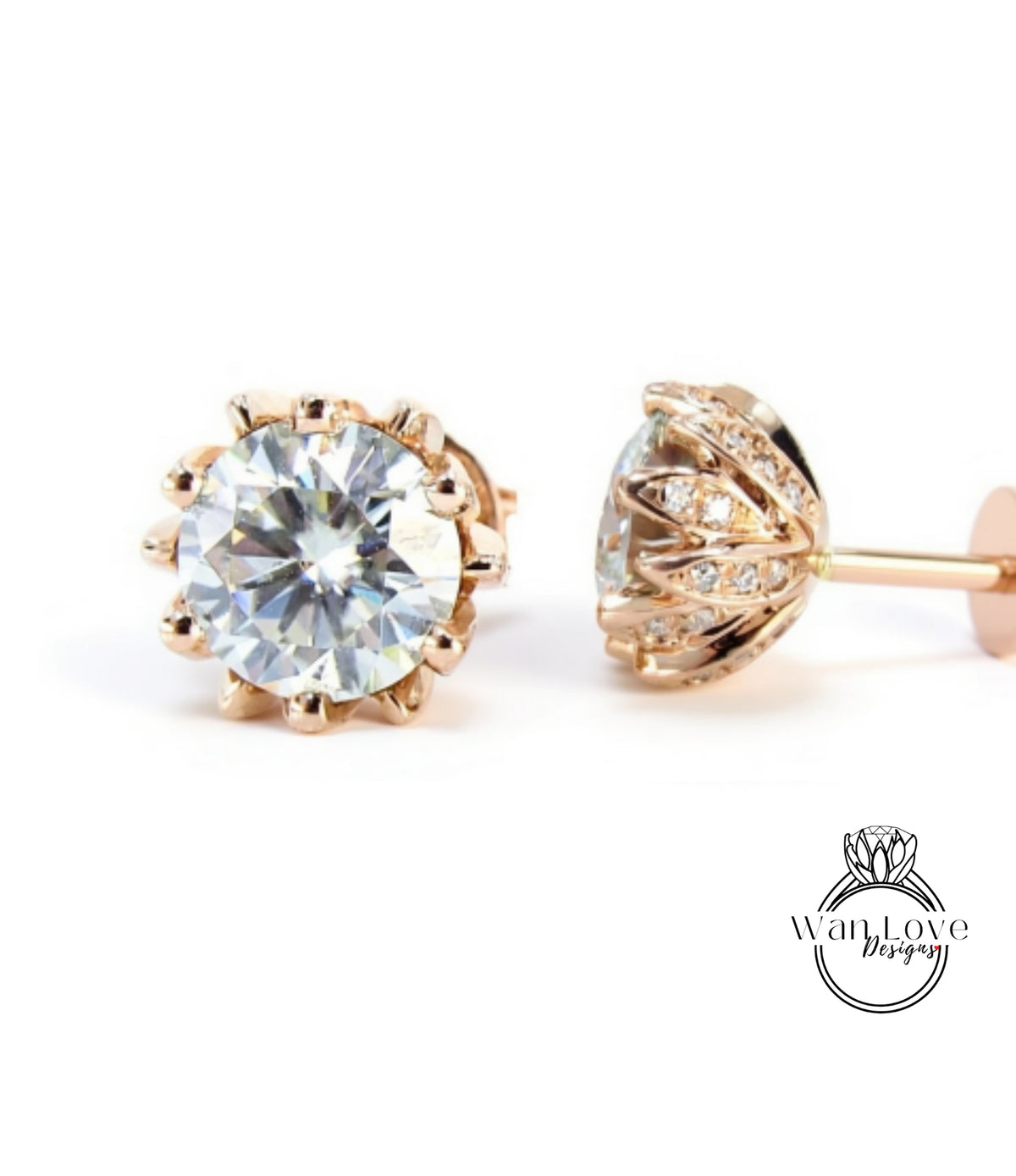 A pair of elegant gold earrings with a large, brilliant-cut diamond at the center, surrounded by a delicate floral design.