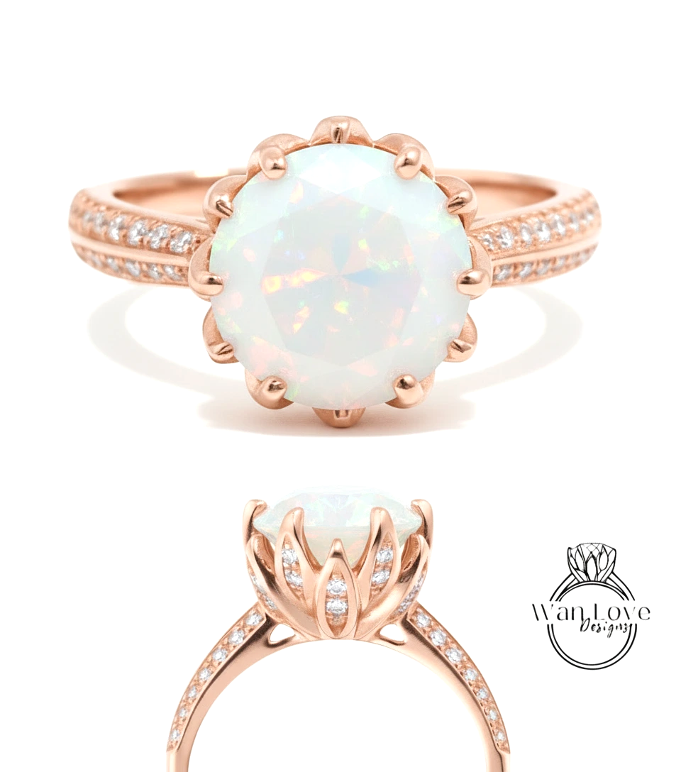 a beautiful rose gold ring with a large oval-shaped opal gemstone set in a scalloped band.