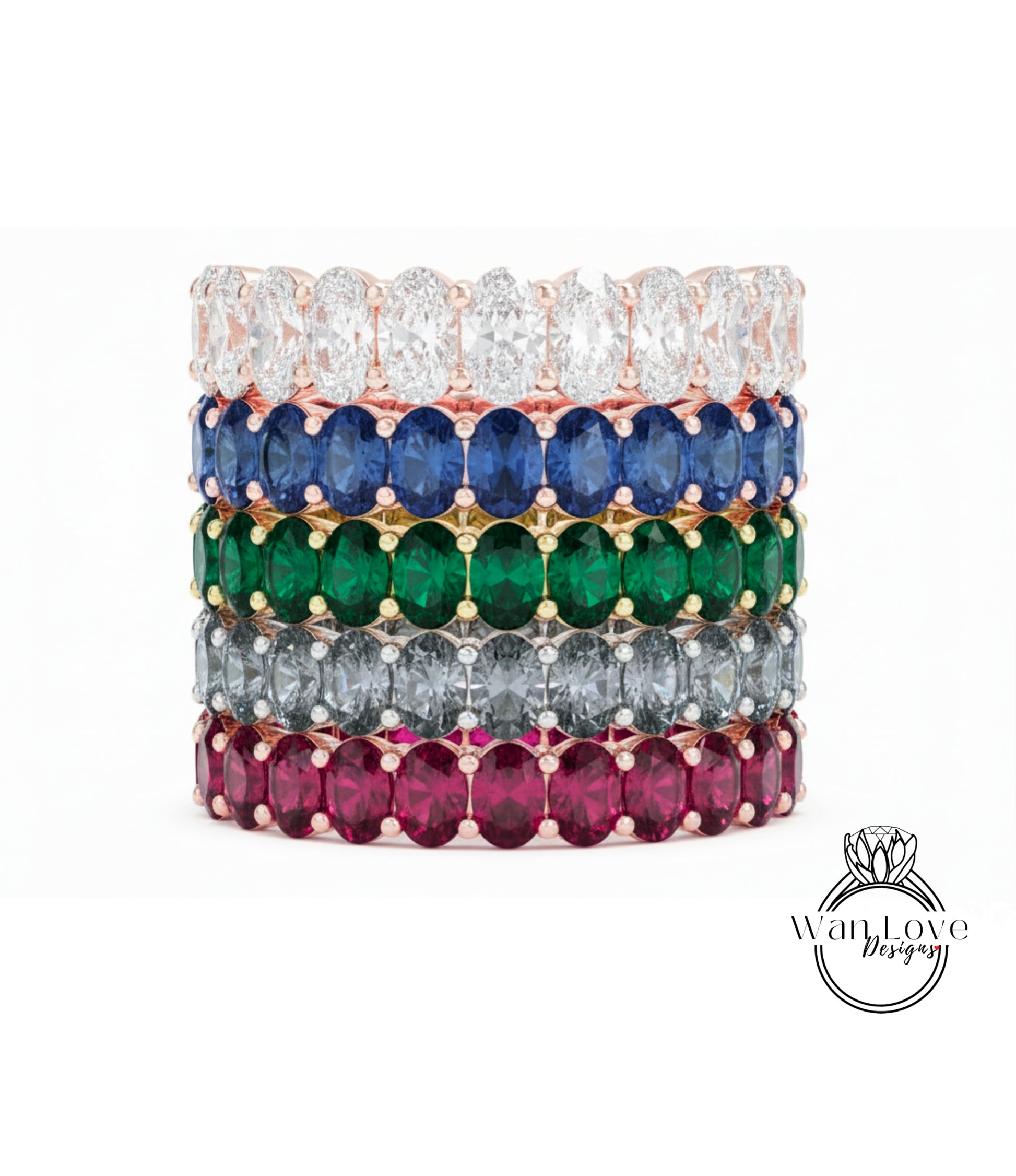 A stack of colorful rings with various gemstones, including diamonds and gemstones in different colors.