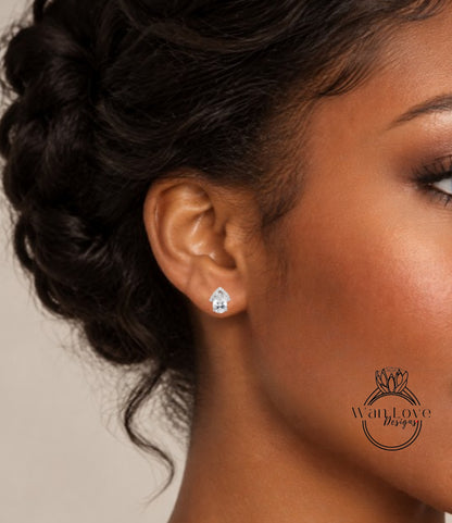 A close-up of a woman's face, focusing on her ear with a diamond earring.