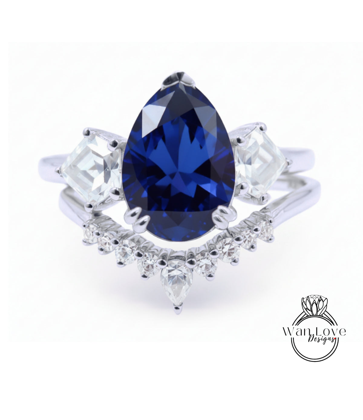 A close-up of a silver ring with a large blue gemstone, surrounded by smaller diamonds.