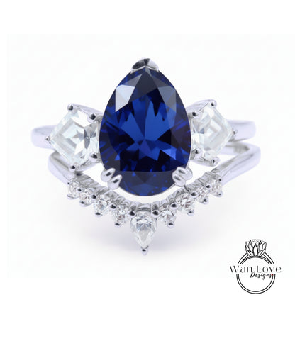 A close-up of a silver ring with a large blue gemstone, surrounded by smaller diamonds.