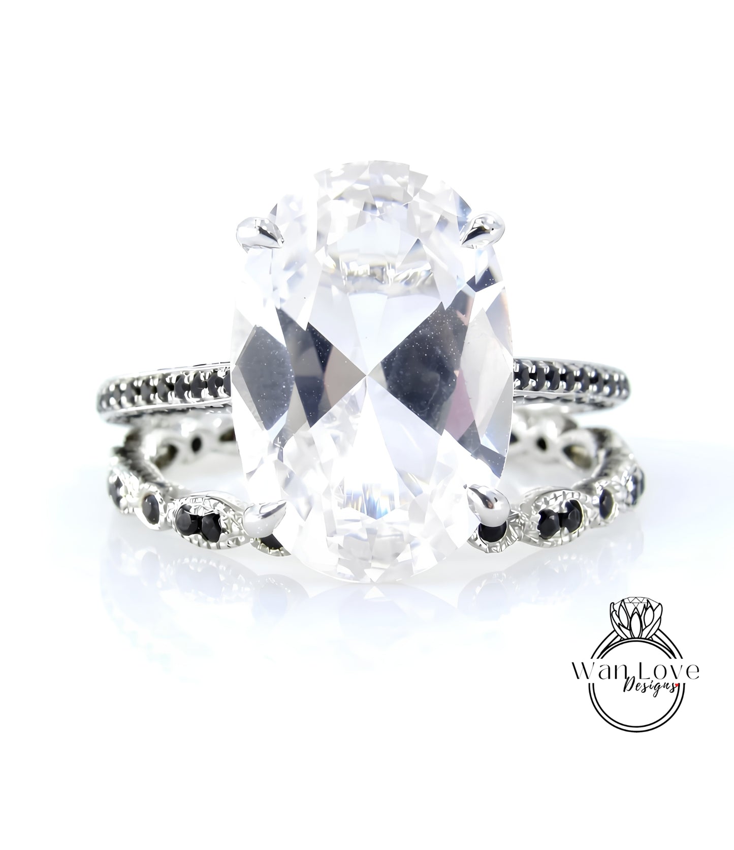 A large, clear gemstone ring with a black band around it, showcasing the intricate design and craftsmanship of the jewelry piece.