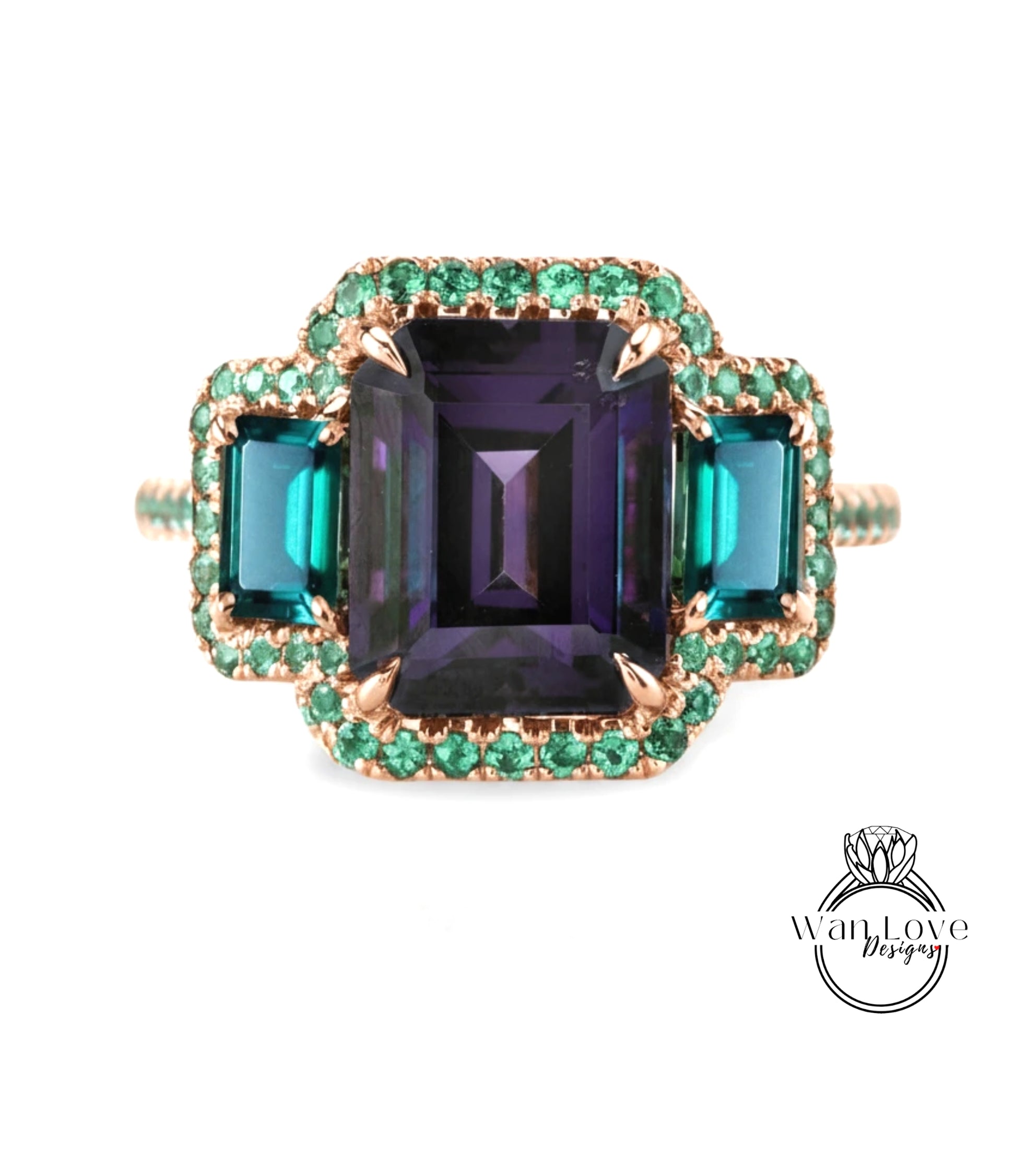A ring with a large purple gemstone surrounded by smaller green gemstones, set in a gold band with a green accent.