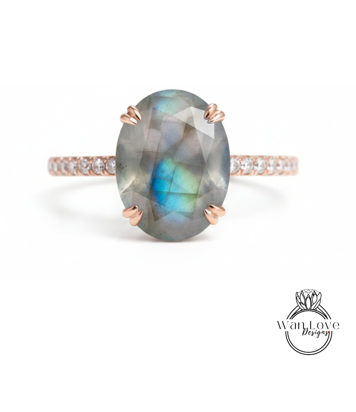 a ring with a large oval-shaped gemstone, possibly a diamond, set in a rose gold band.