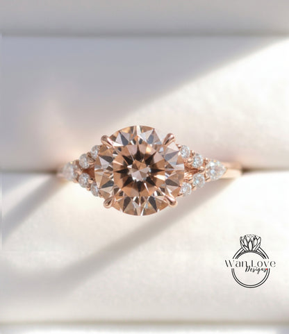 A close-up image of a gold ring with a large, round diamond at the center, surrounded by smaller diamonds.