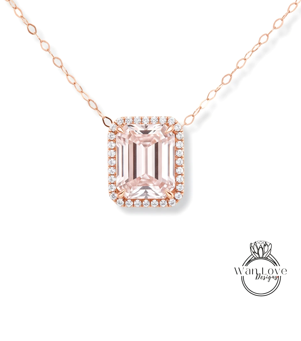 A necklace with a large, pink gemstone set in a halo of smaller diamonds.