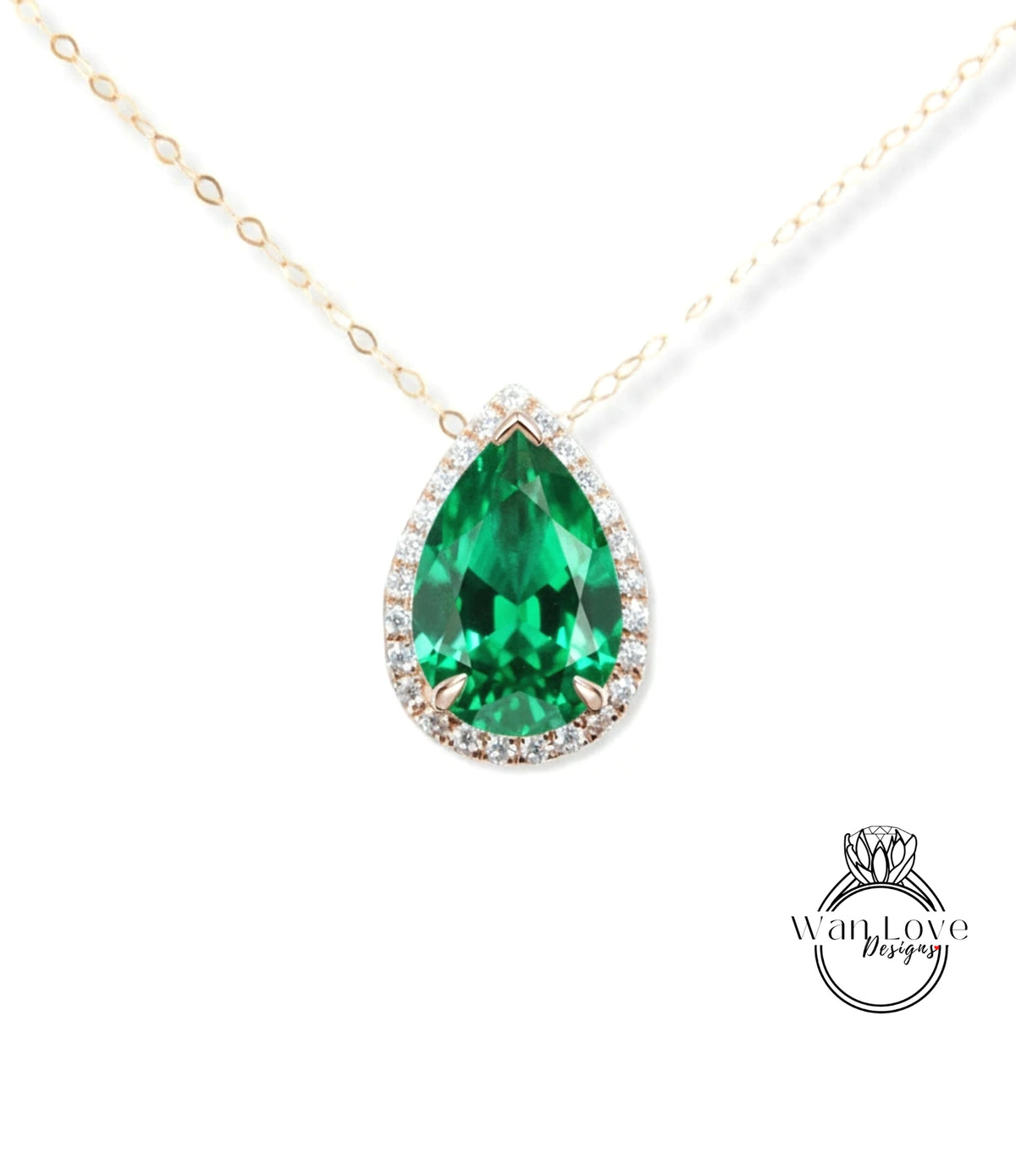 A close-up of a necklace with a large, green gemstone pendant.