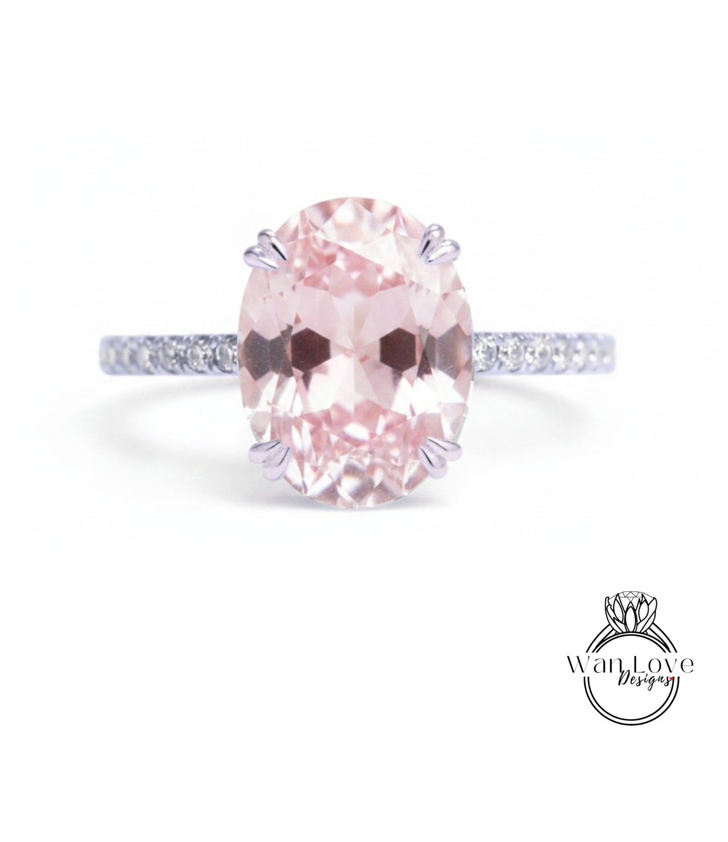 A pink gemstone engagement ring with a band and a logo for a jewelry designer.
