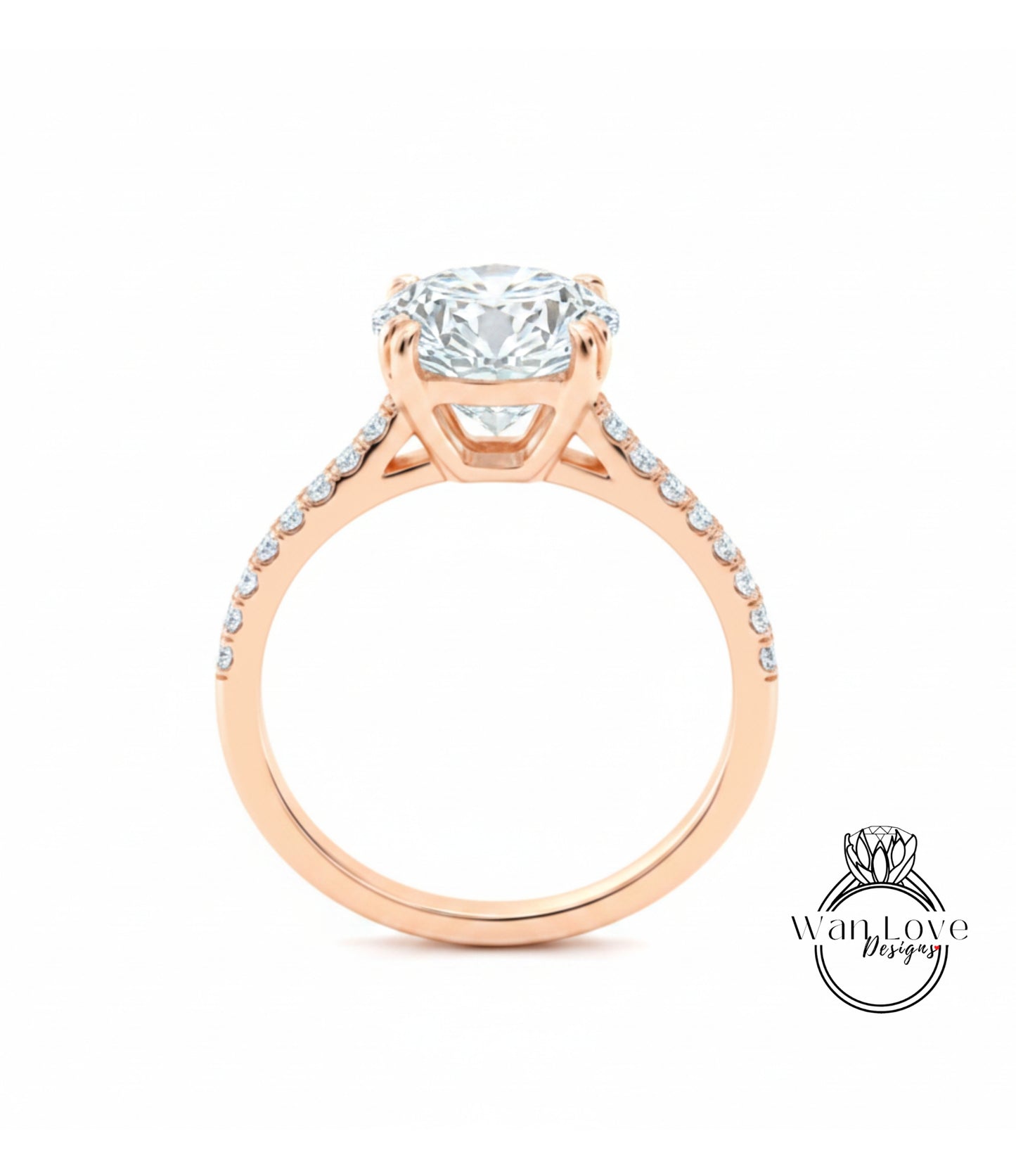 A close-up of a gold engagement ring with a large diamond set in the center, surrounded by smaller diamonds on the band.