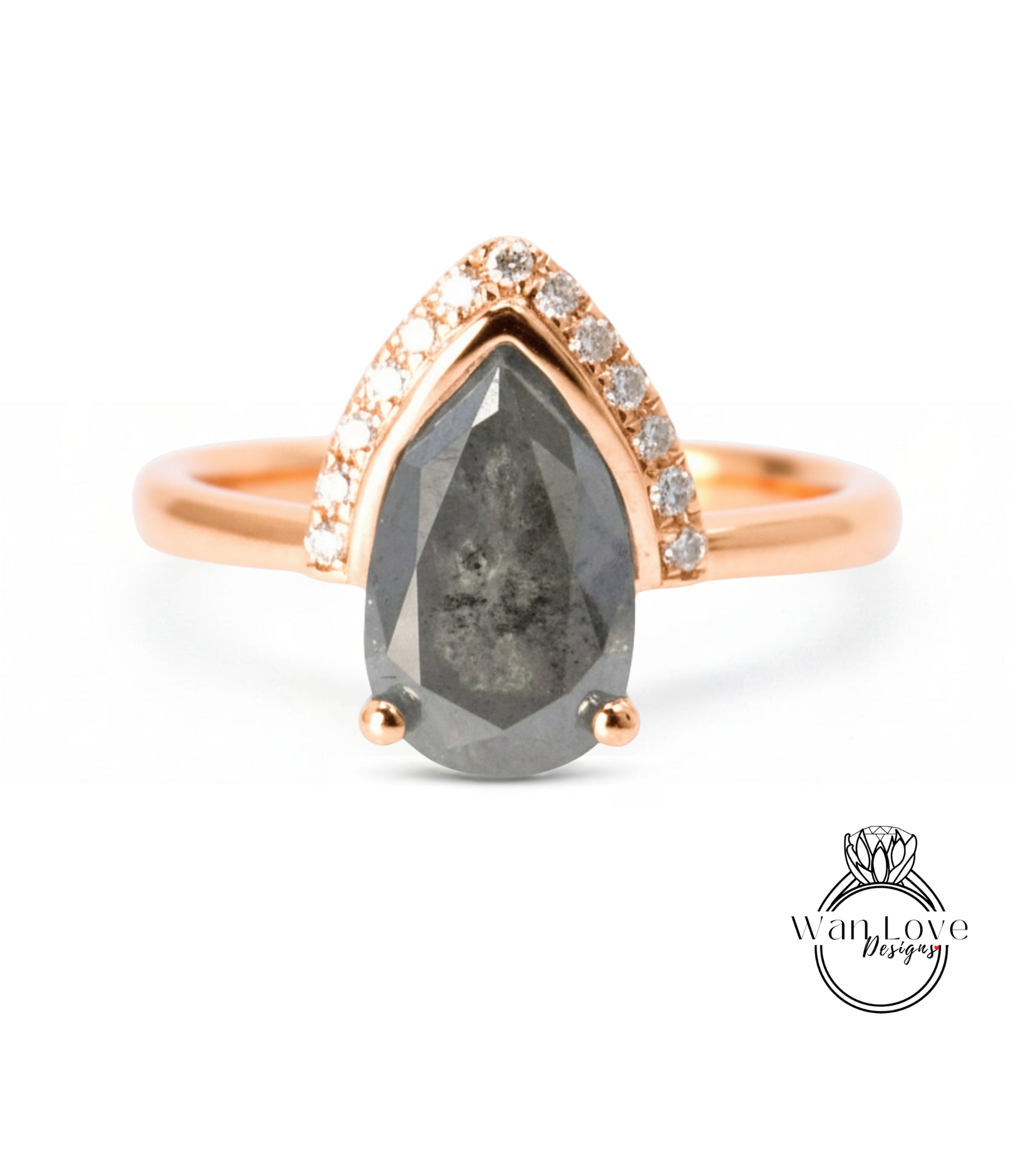 a ring with a large grey diamond as the centerpiece, surrounded by smaller diamonds and set in a gold band.