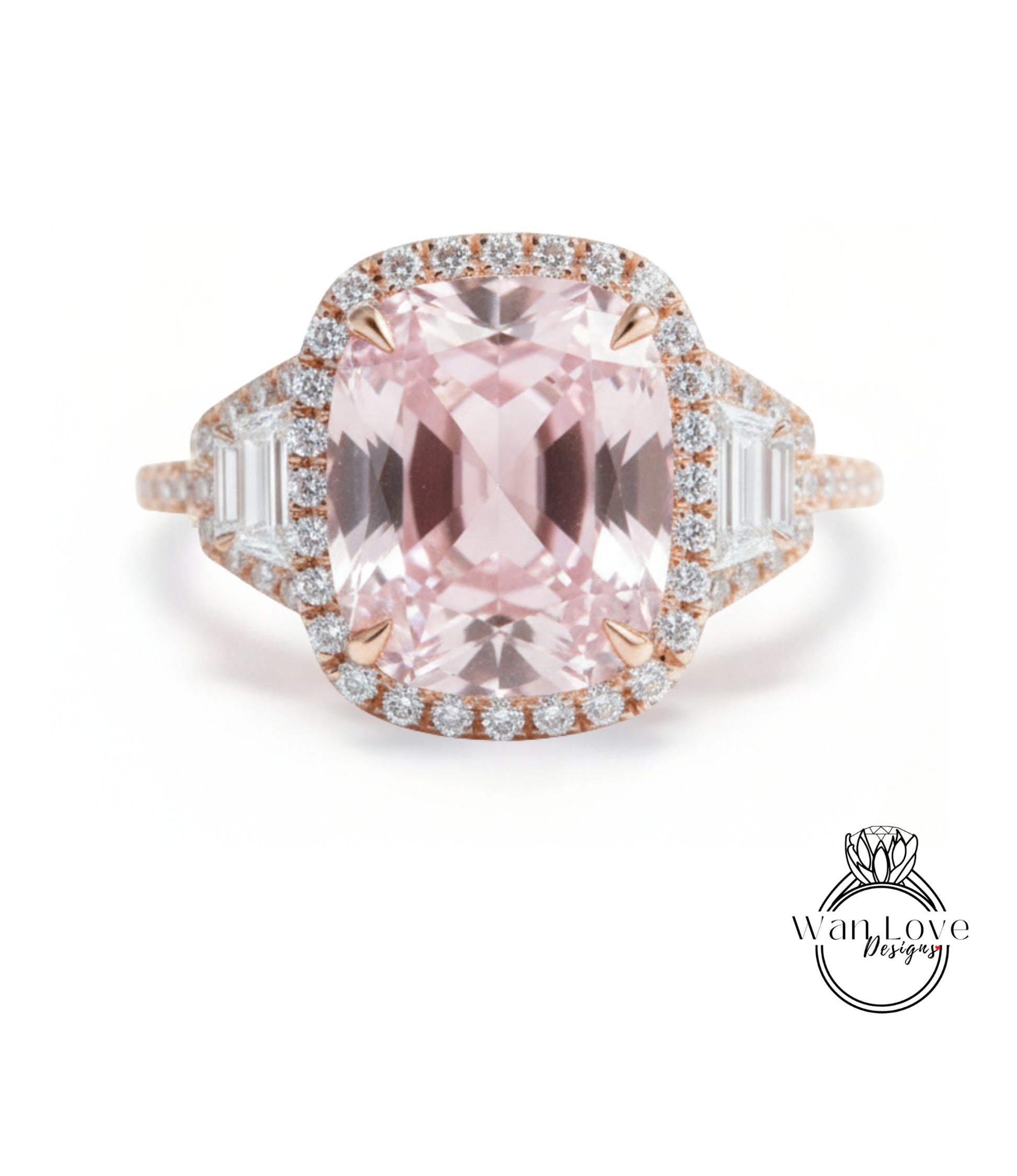 A stunning pink gemstone ring with a halo of diamonds around the center stone.