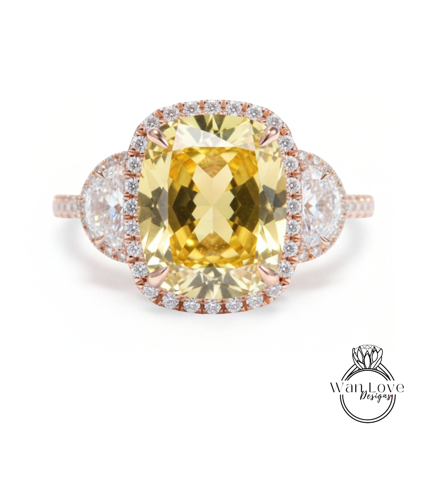 A large yellow gemstone ring with a halo of smaller diamonds around it, set in a rose gold band.