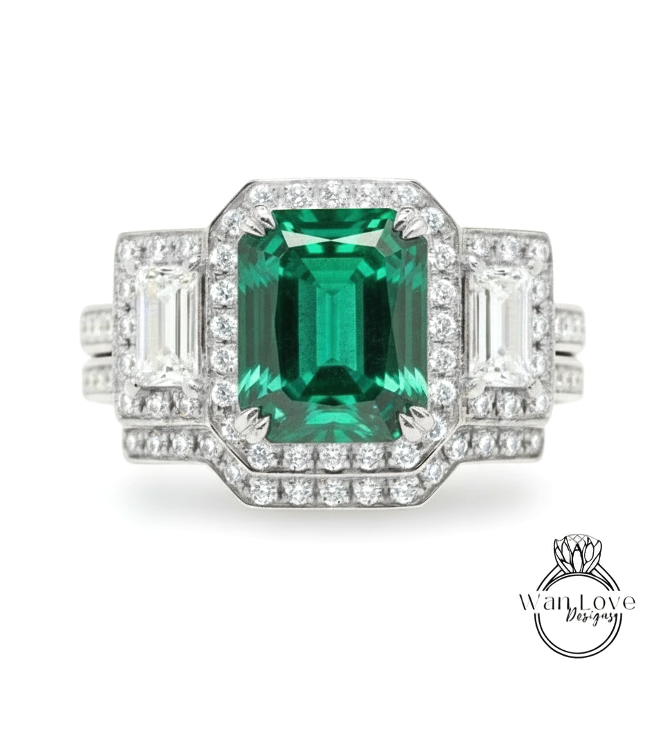 A stunning engagement ring featuring a large, vibrant green gemstone surrounded by a halo of sparkling diamonds.