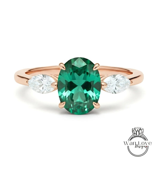 a beautiful engagement ring with a large oval-shaped green gemstone set in a rose gold band.