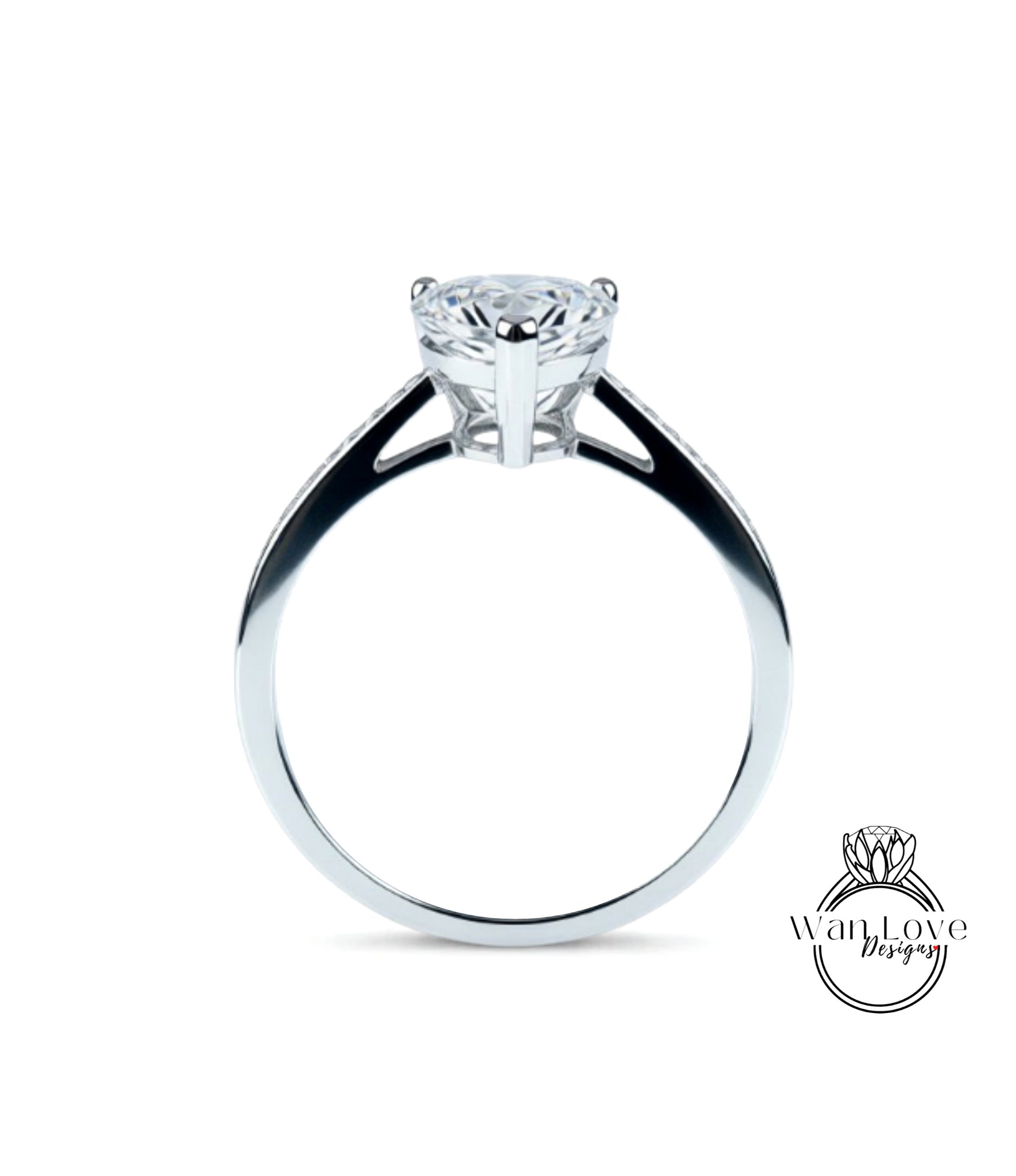 A silver engagement ring with a large diamond set in the center.