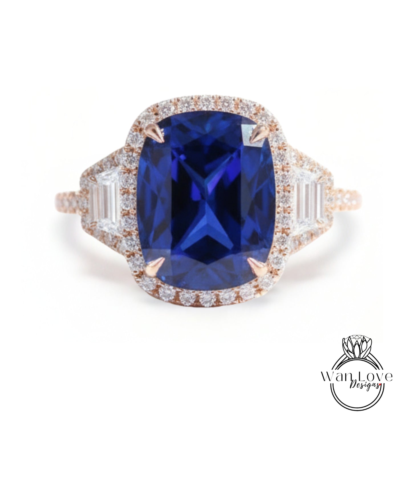 A large, blue gemstone ring with a halo of smaller diamonds around the center stone.