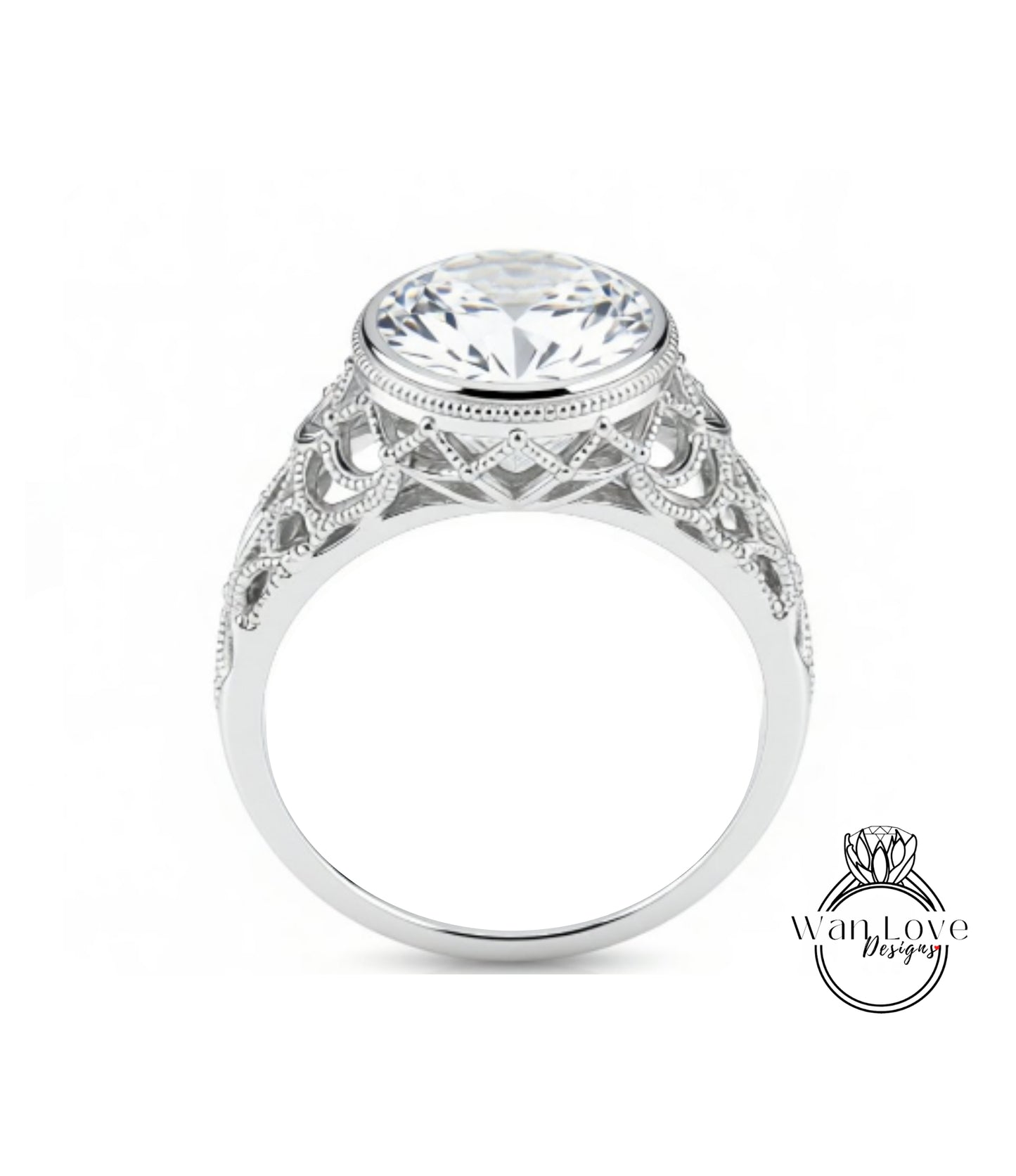 A close-up of a silver ring with a large, round diamond at the center, showcasing the intricate design and craftsmanship of the piece.